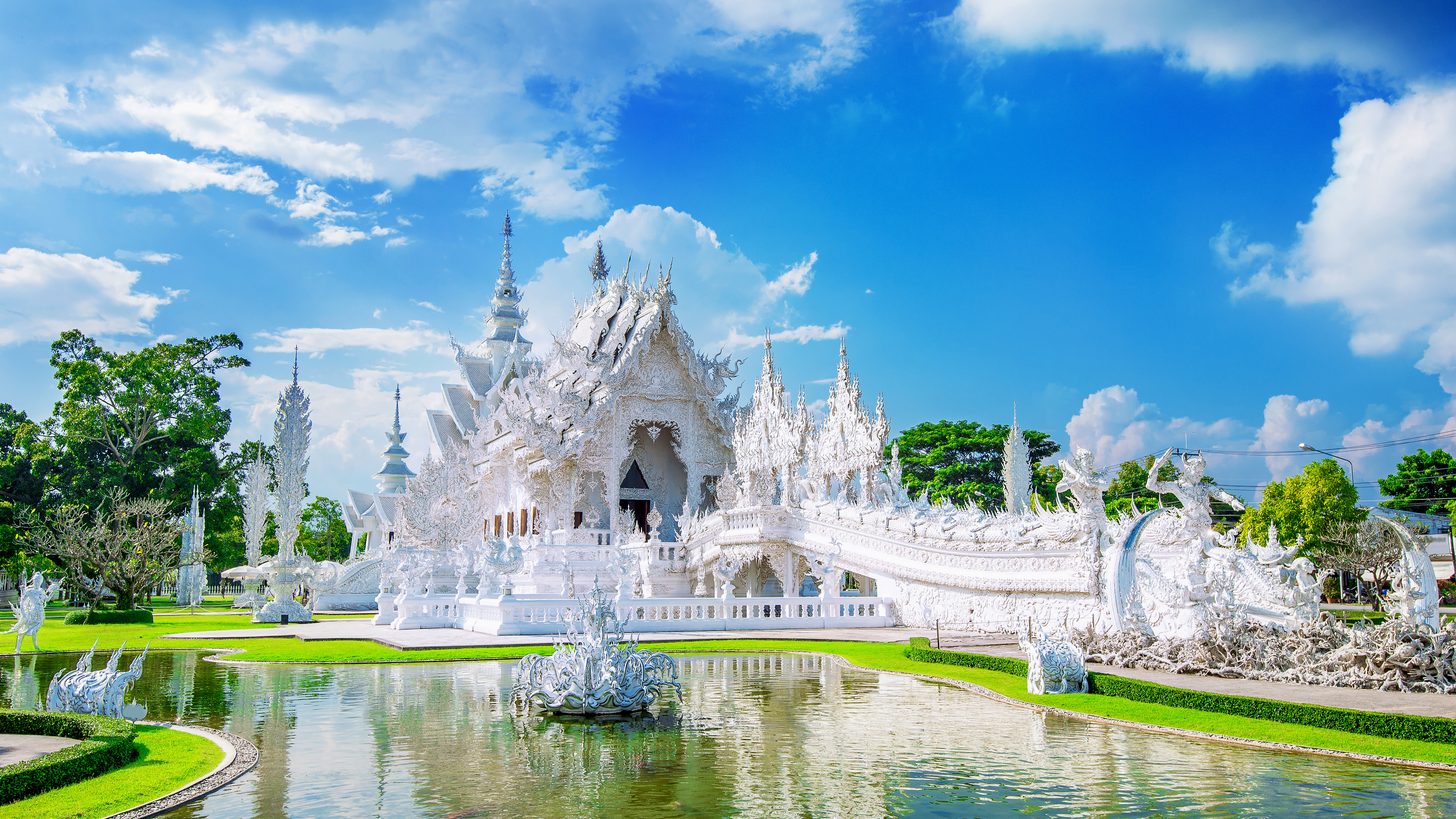 The dazzling white facade of Wat Rong Khun, the White Temple in Chiang Rai