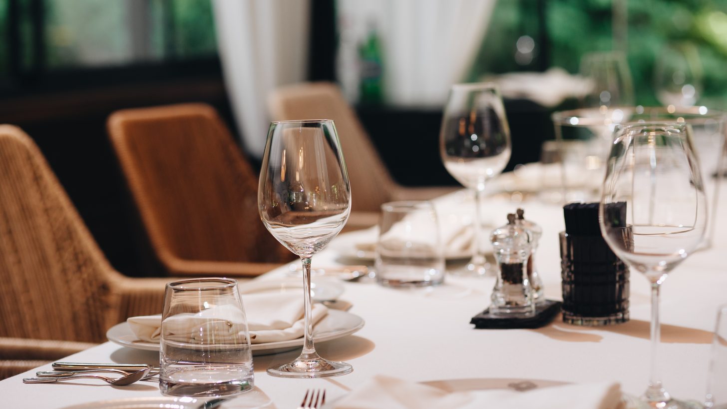 An elegant fine-dining restaurant table setting