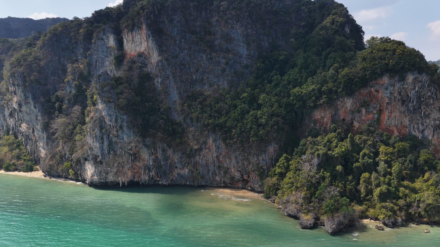 Limestone karst islands and turquoise water in a Thailand marine national park