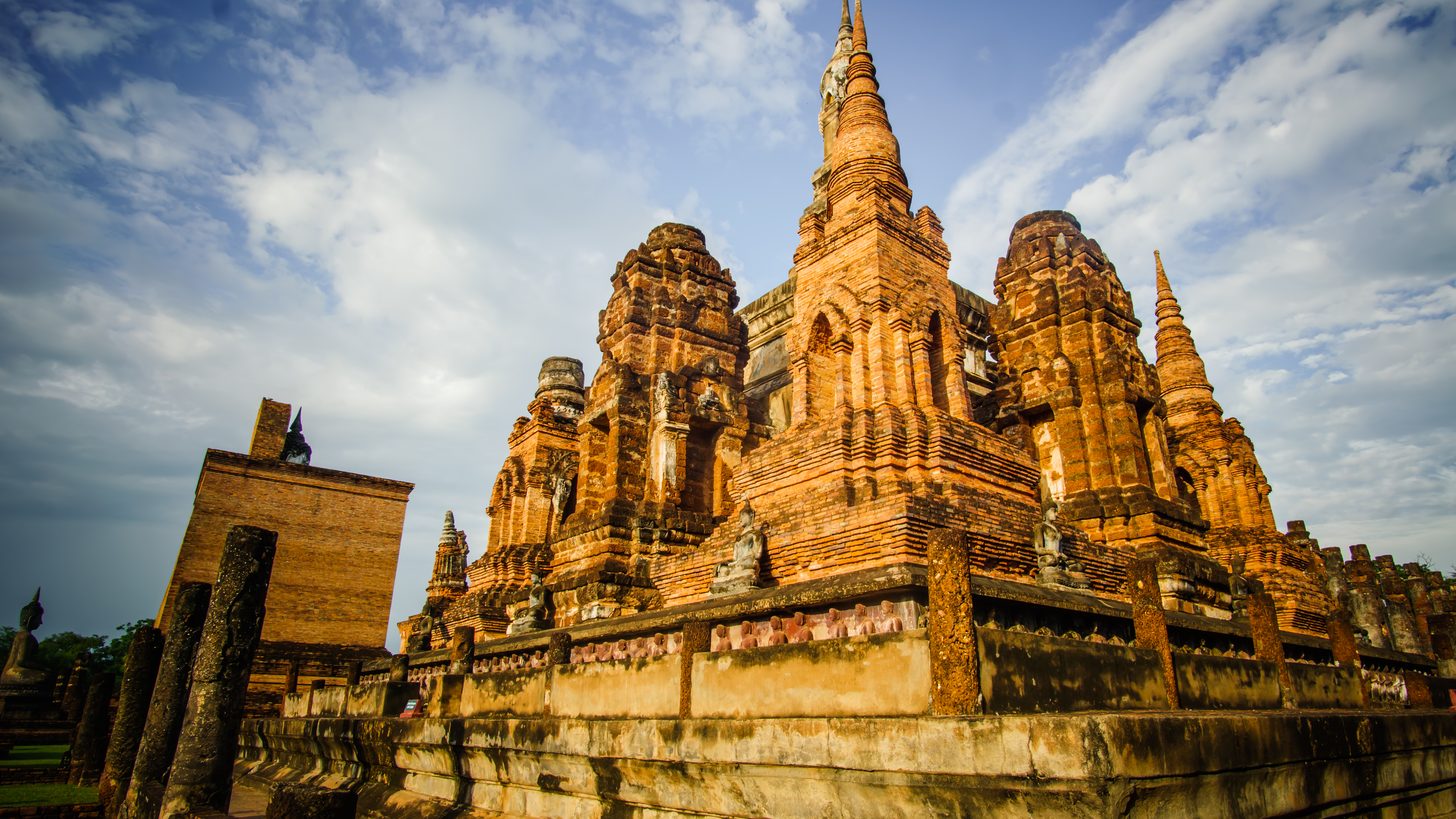 Ancient towers of Wat Mahathat temple in Sukhothai Historical Park