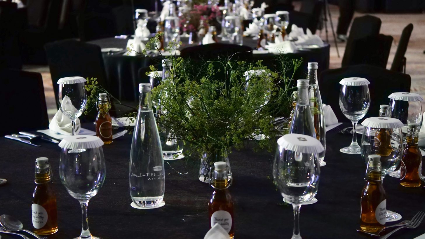An elegant banquet table set for a formal gala event