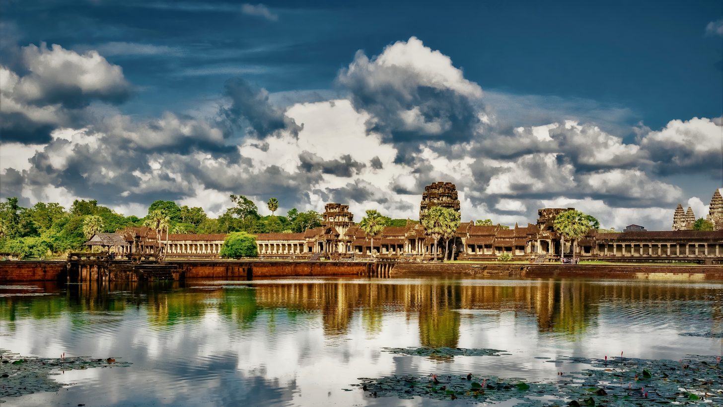 Angkor Wat temple reflected in a lake at dawn, Cambodia
