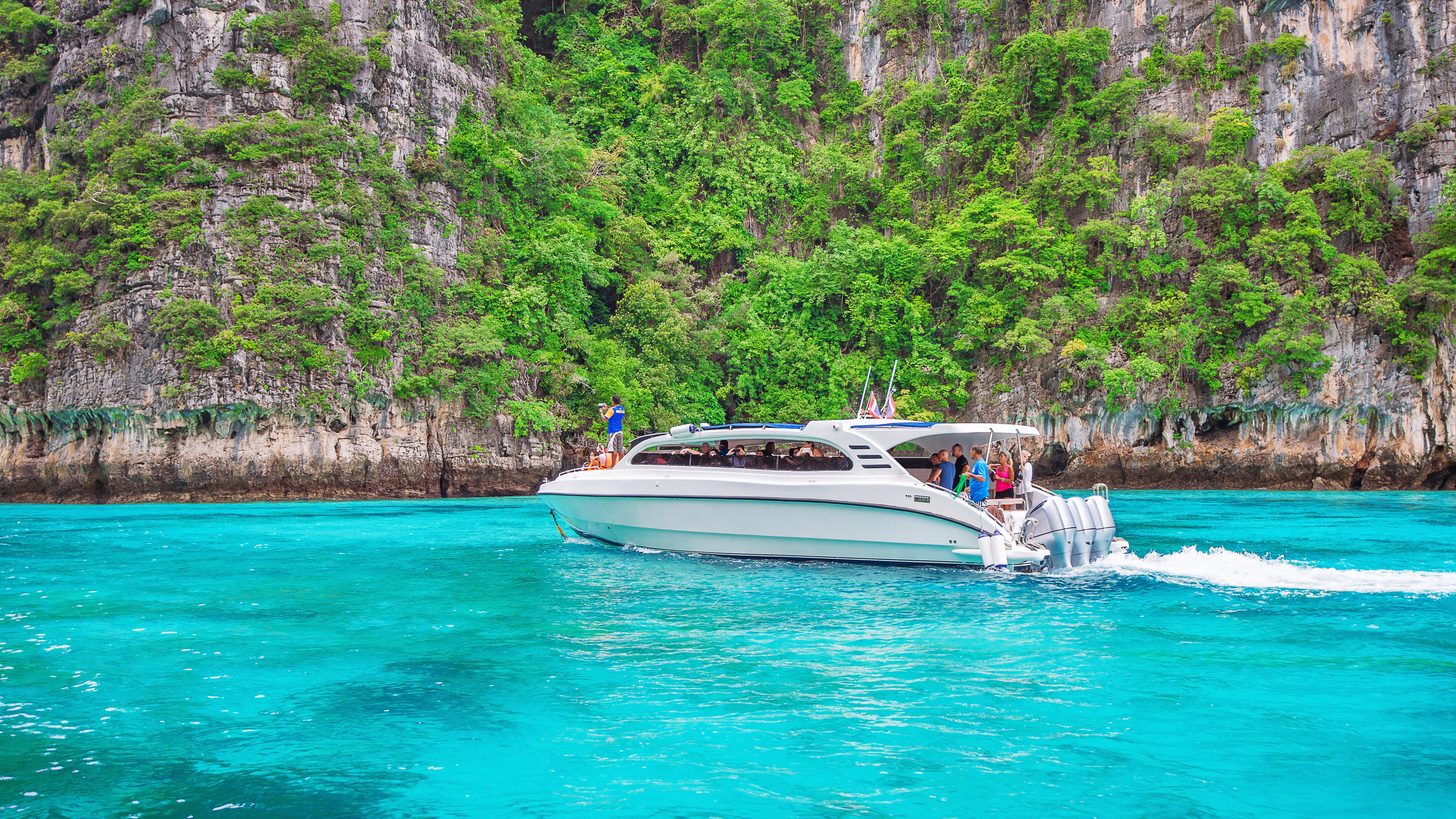A speedboat crossing the Andaman Sea near the Phi Phi islands
