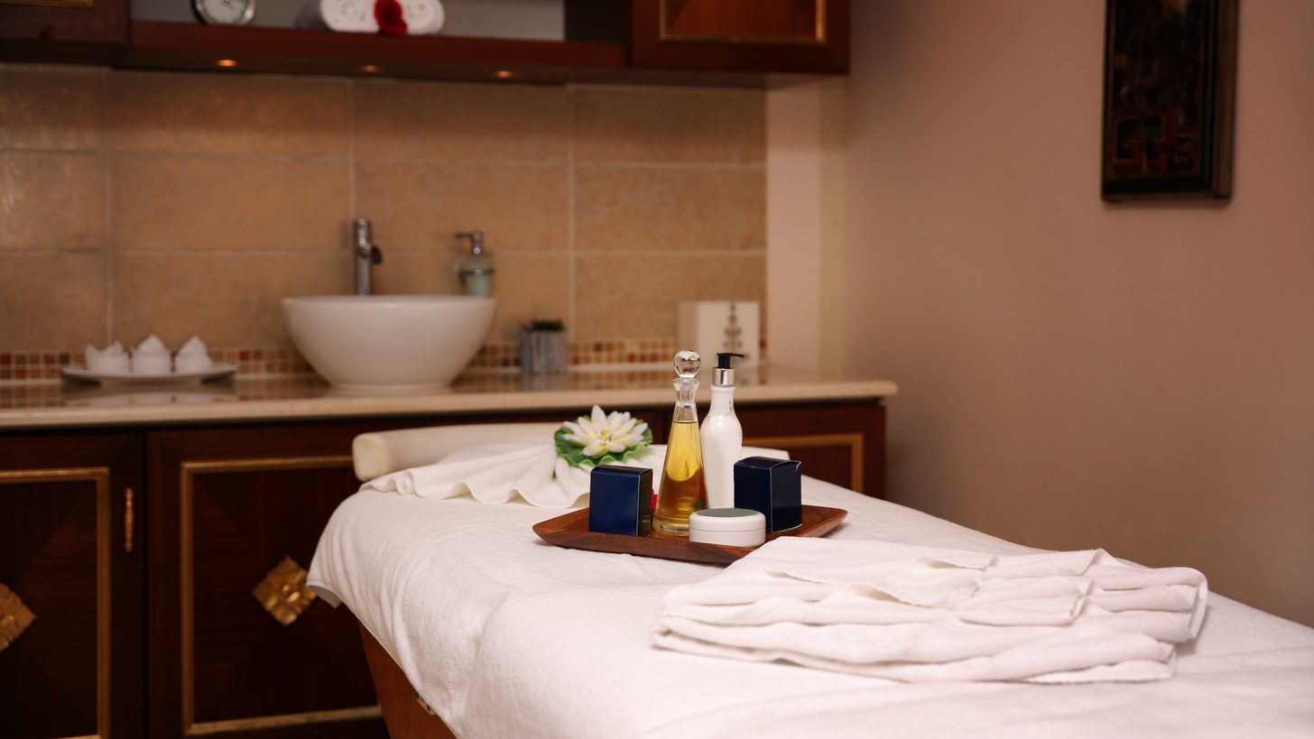 A hotel spa treatment room prepared for a guest