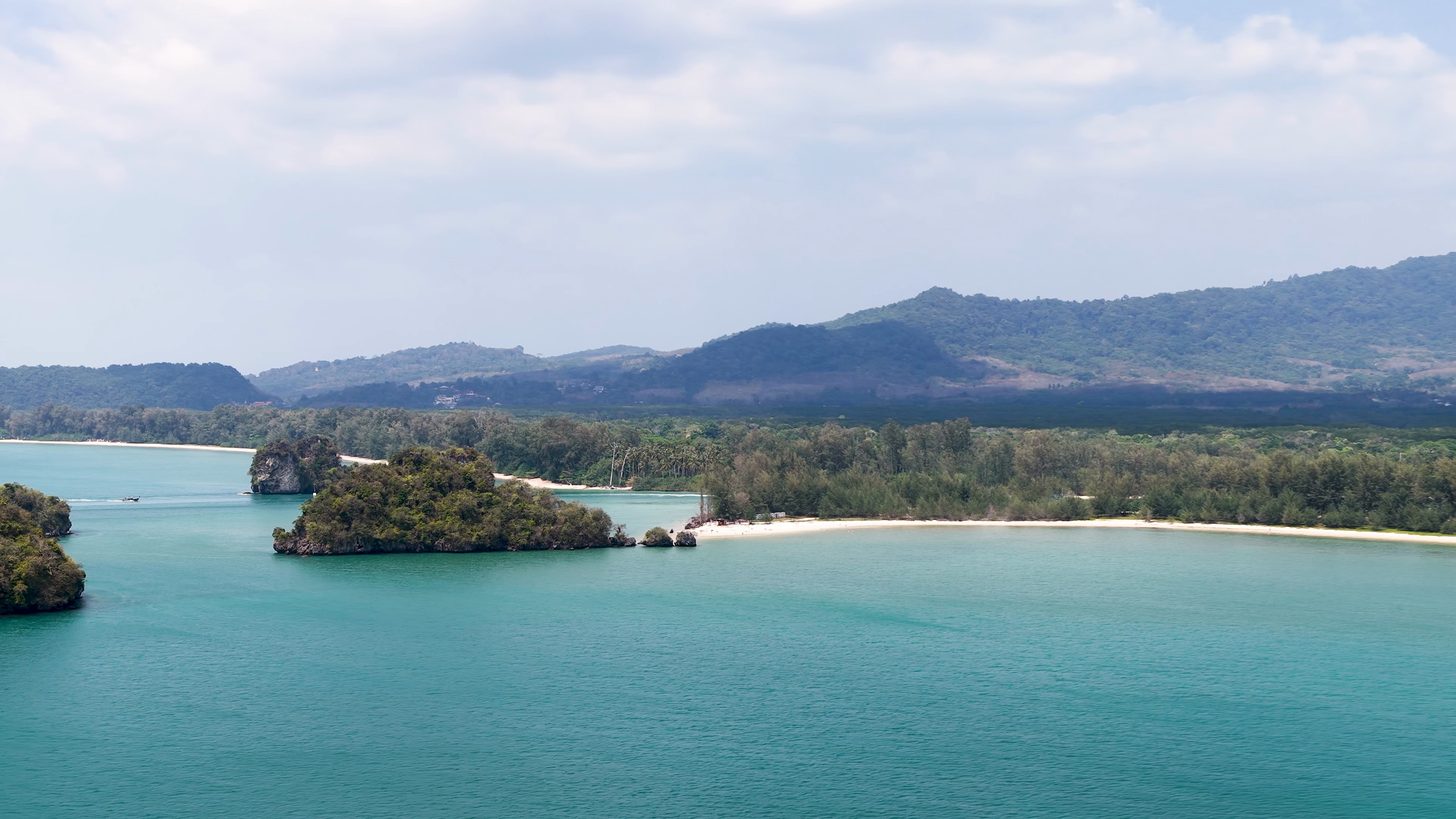 Aerial view of limestone karst islands and coastline in Krabi
