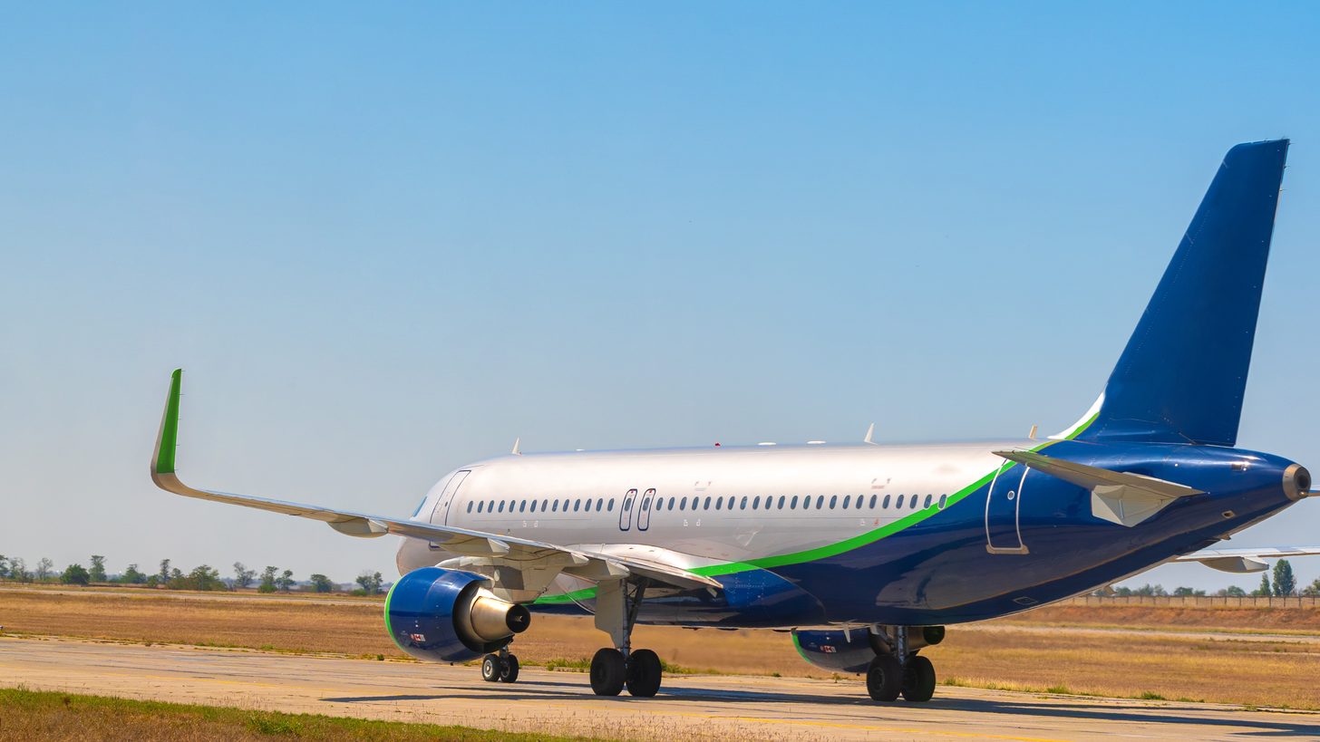 A passenger aircraft on the taxiway at an airport