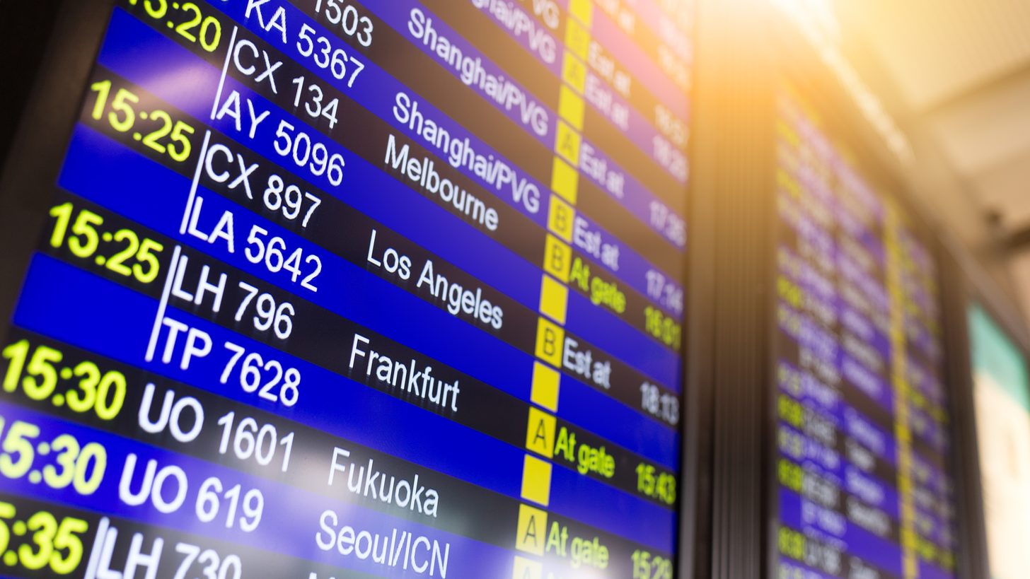 An airport departures information board