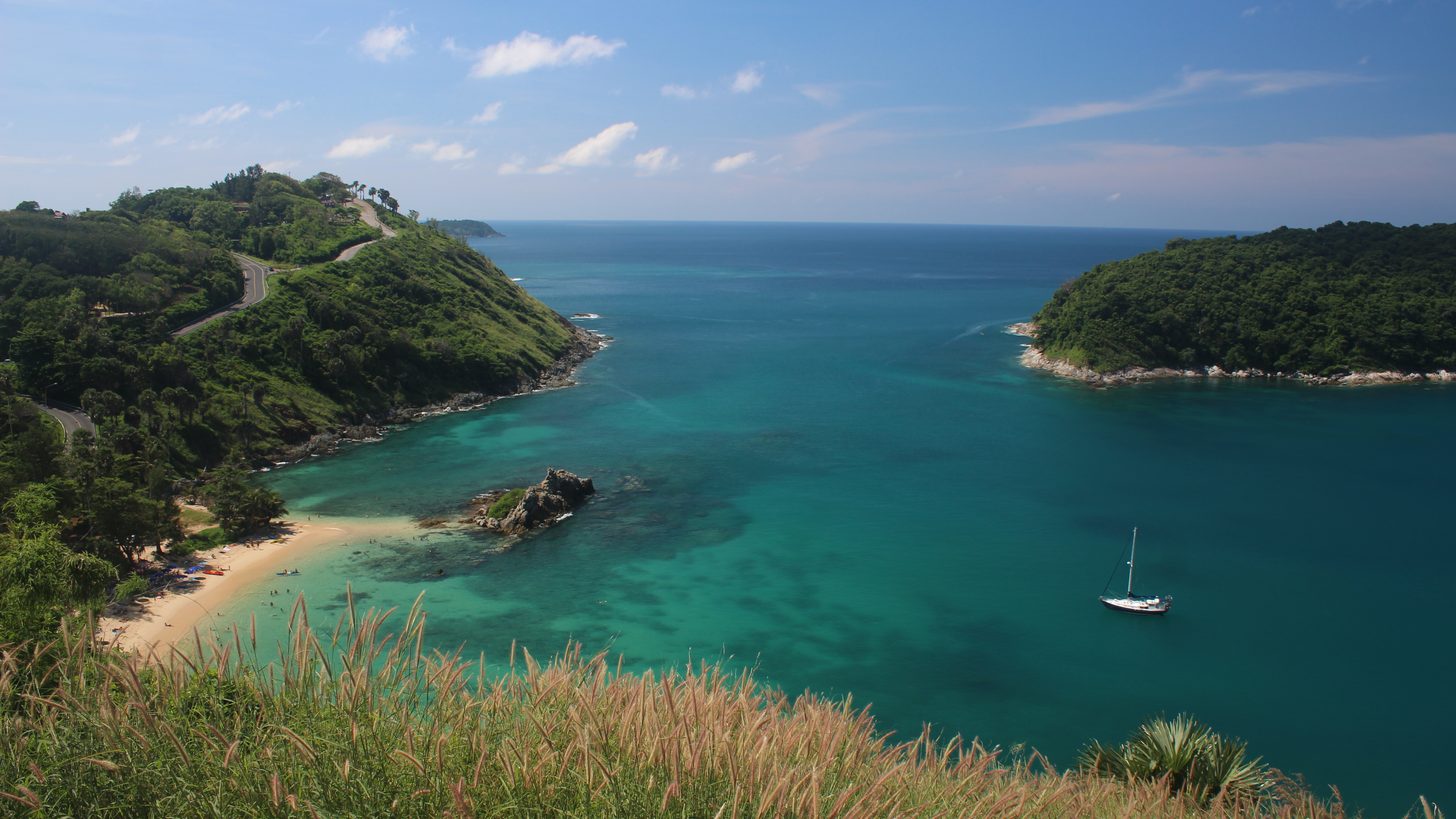 A green headland and a sheltered bay on the southern coast of Phuket