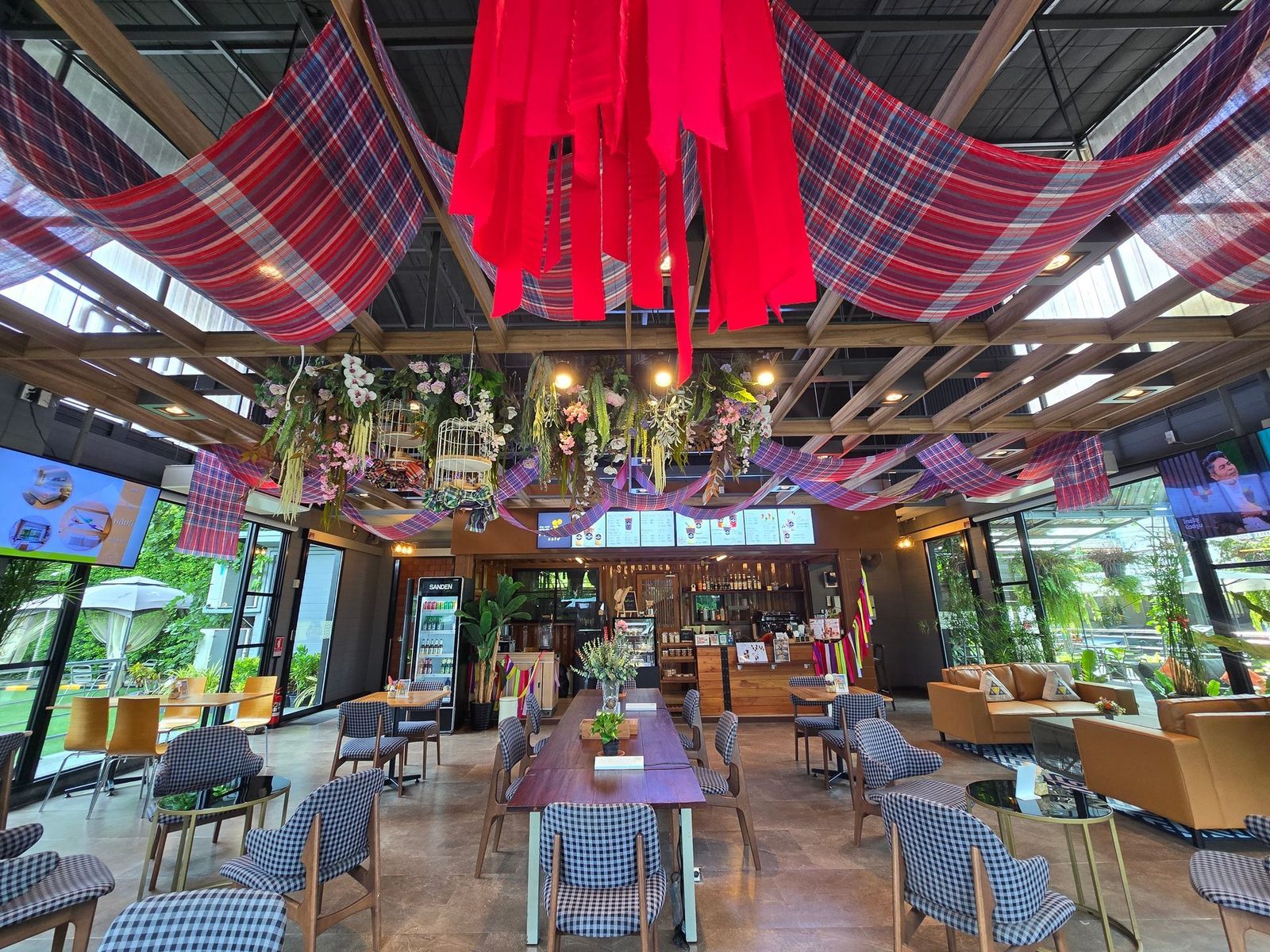 Restaurant dining area with Isan textile decor at AISANA Hotel Korat