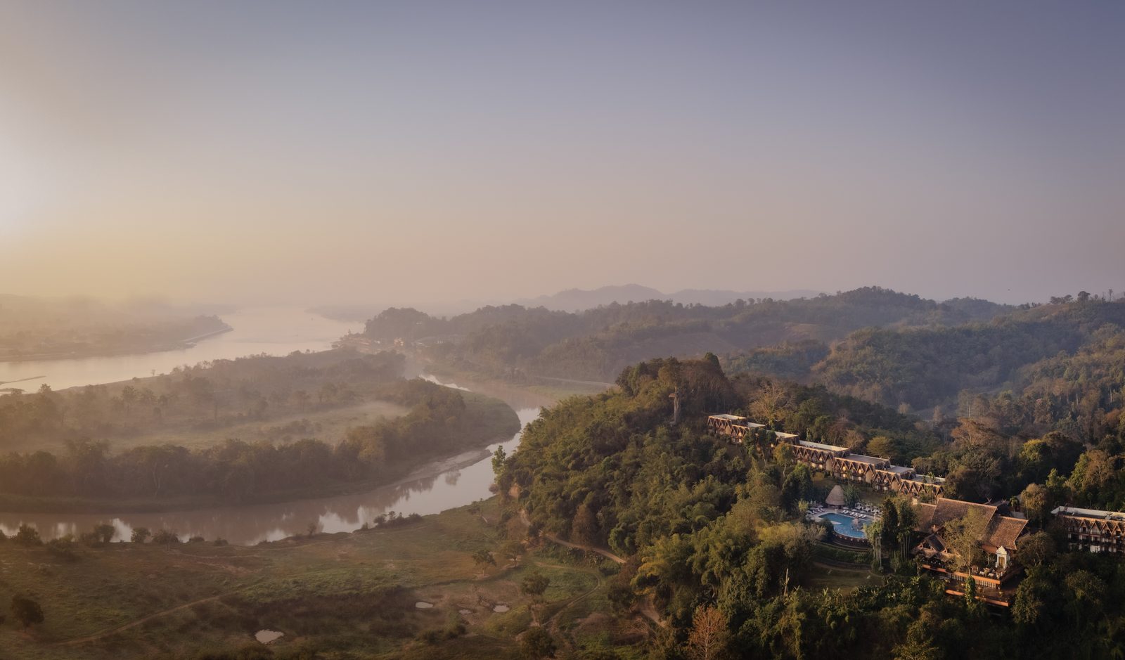 Panoramic view over the river valley and hills from Anantara Golden Triangle Elephant Camp & Resort