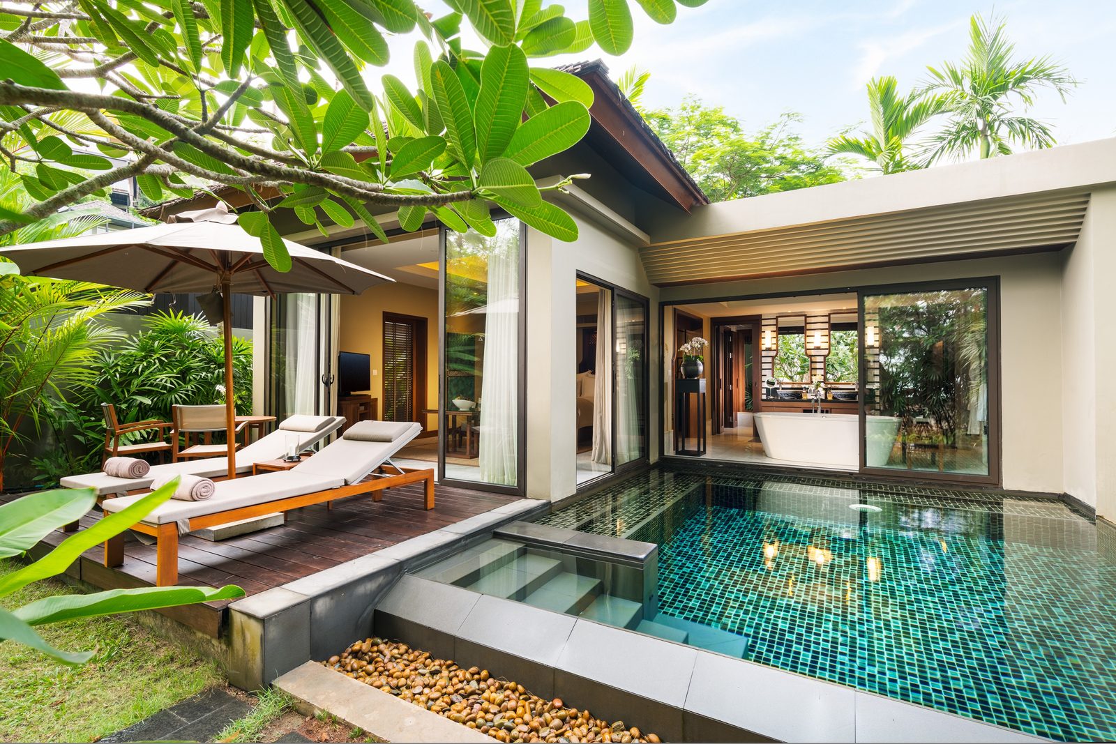 Villa terrace with sun loungers and private pool at Anantara Layan Phuket Resort