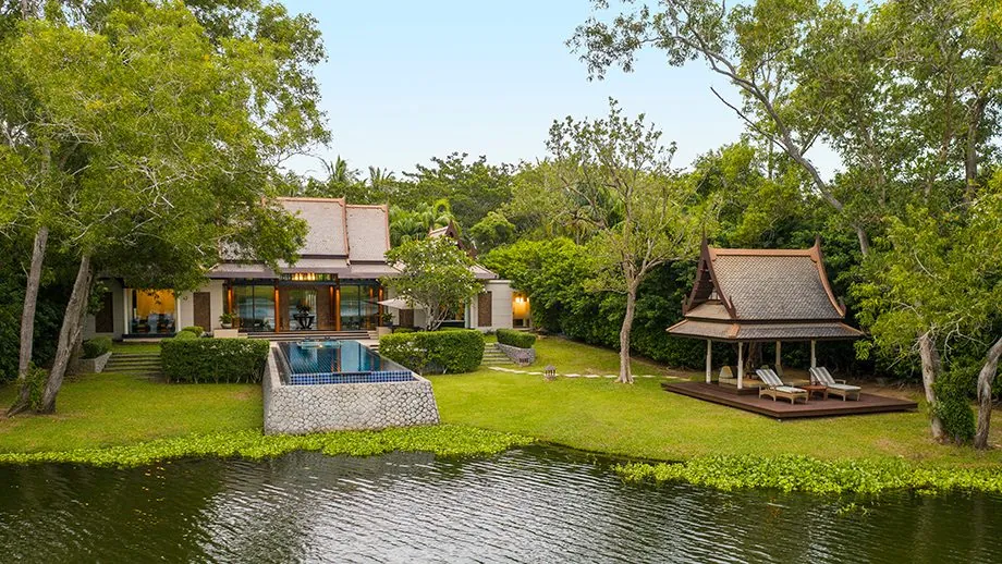 Garden, pool and sala of a Two-Bedroom DoublePool Villa by the lagoon at Banyan Tree Phuket