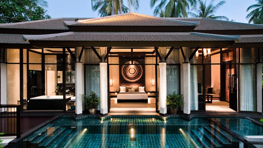 Deluxe Pool Villa at dusk with its private pool at Banyan Tree Samui
