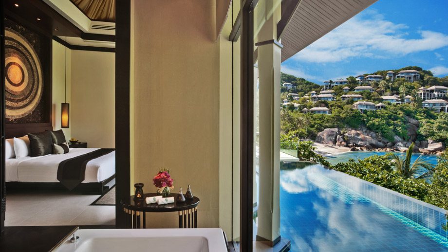 Ocean View Pool Villa bedroom opening onto its infinity pool at Banyan Tree Samui