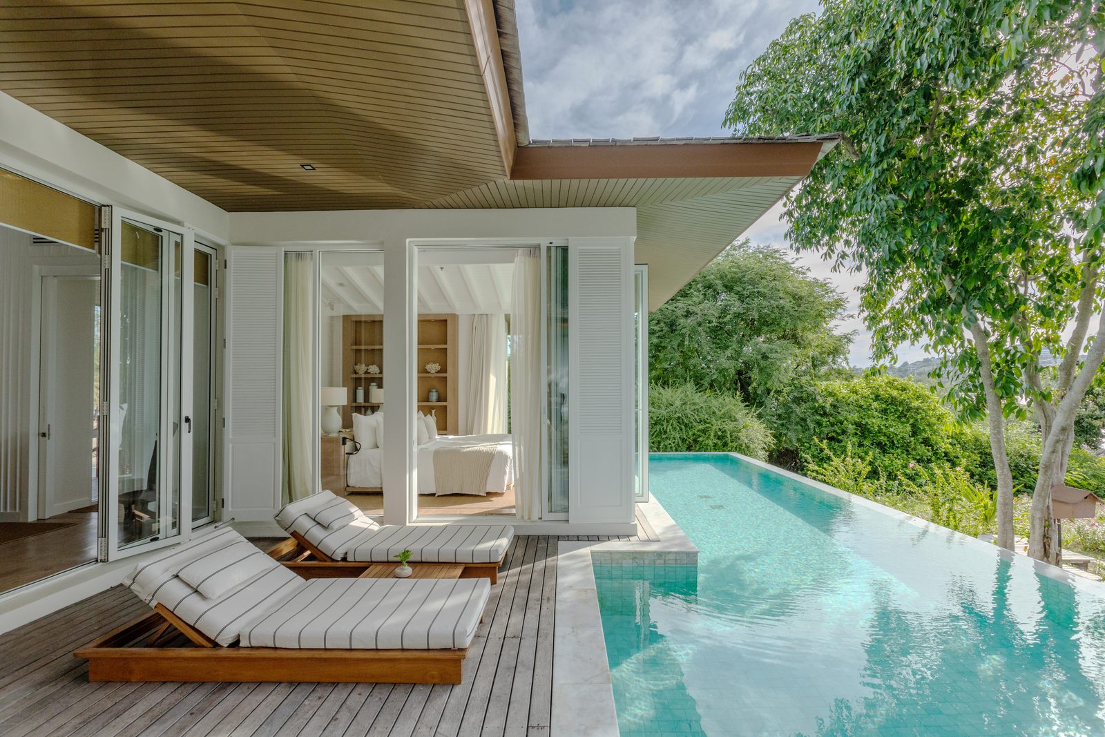 Pool deck of the Fahn Noi Private Island Pool Villa at Cape Fahn Hotel, Samui