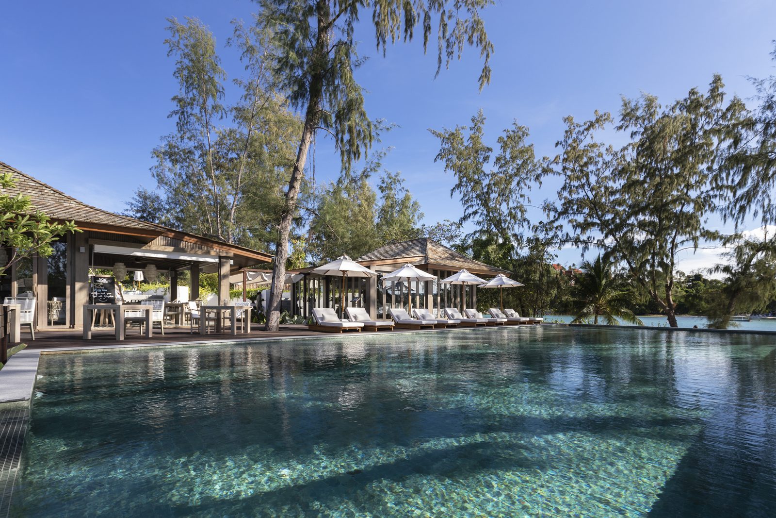 Main swimming pool and beachfront pavilions at Cape Fahn Hotel, Samui