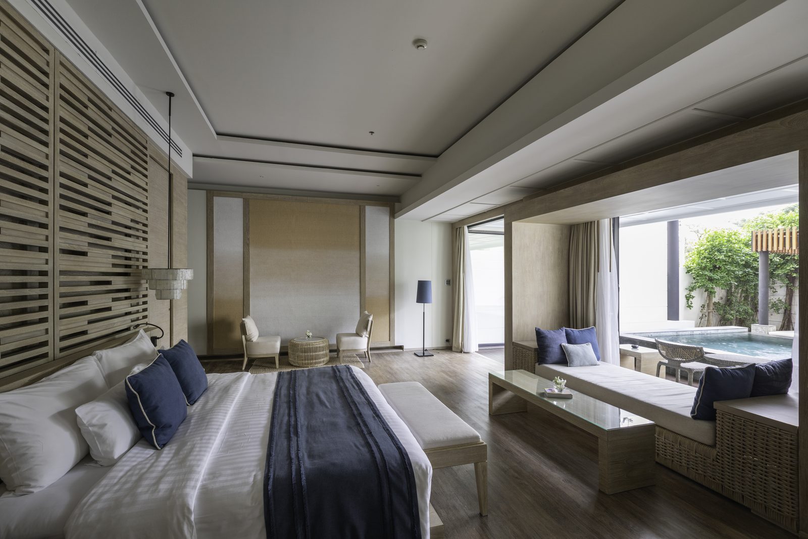 Garden Pool Suite bedroom opening to its private pool at Cape Nidhra Hotel, Hua Hin