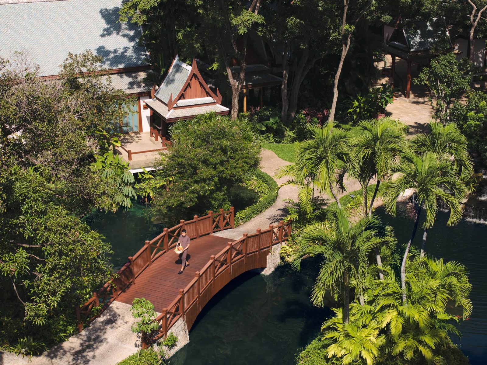 Aerial view of the gardens, pond and footbridge at Chiva-Som Hua Hin