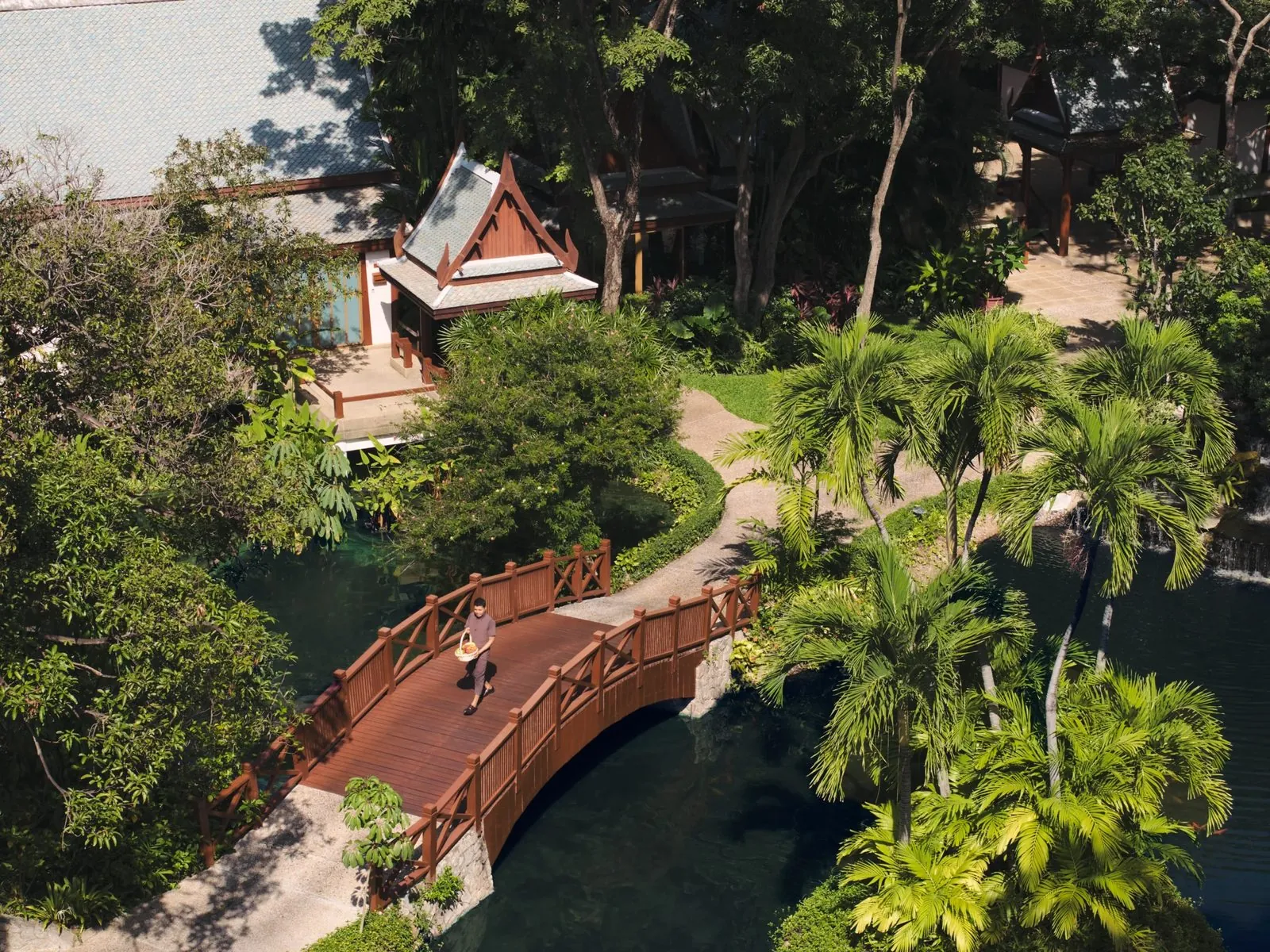 Aerial view of the gardens, pond and footbridge at Chiva-Som Hua Hin
