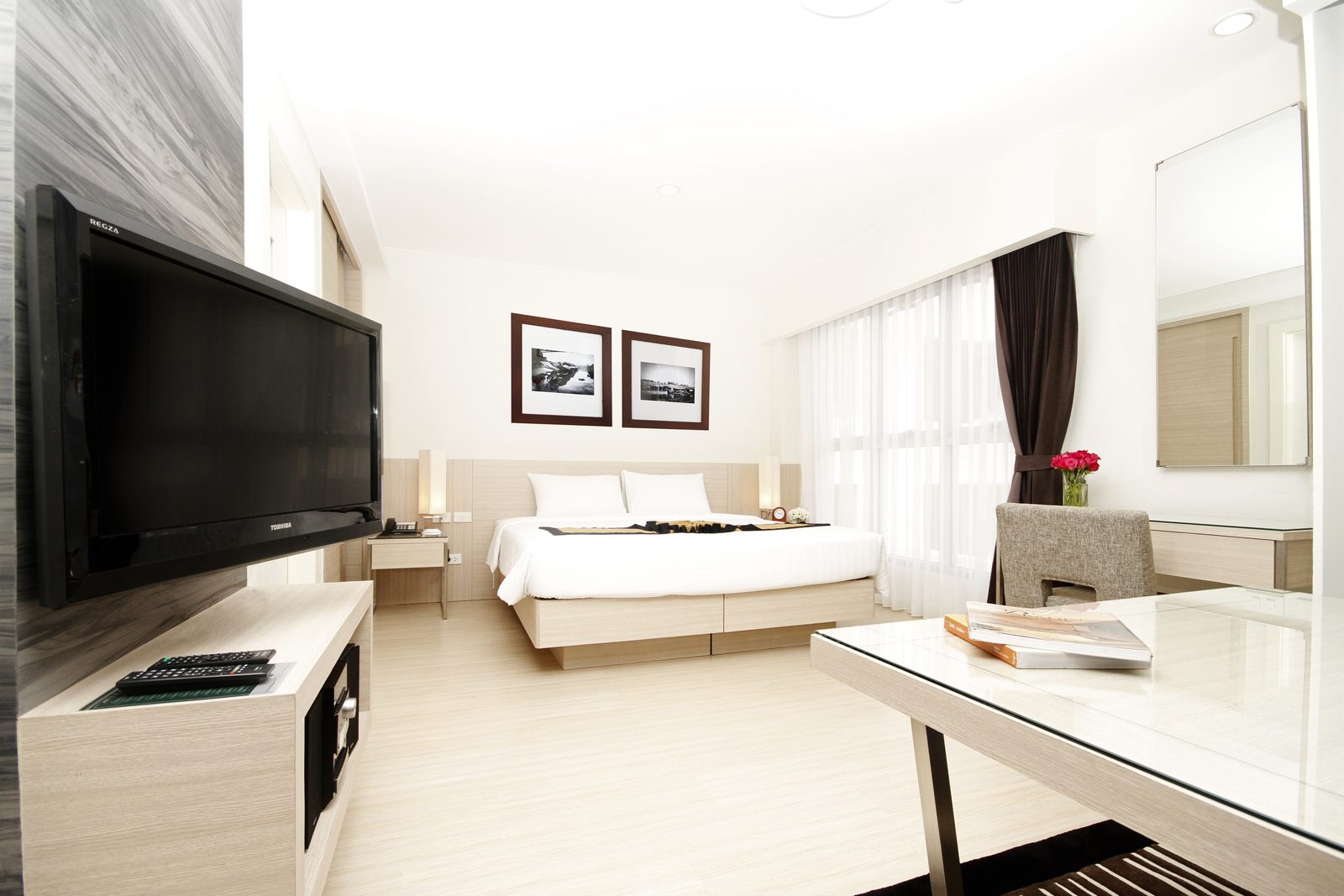 Studio Suite bedroom and work area at Classic Kameo Hotel, Ayutthaya