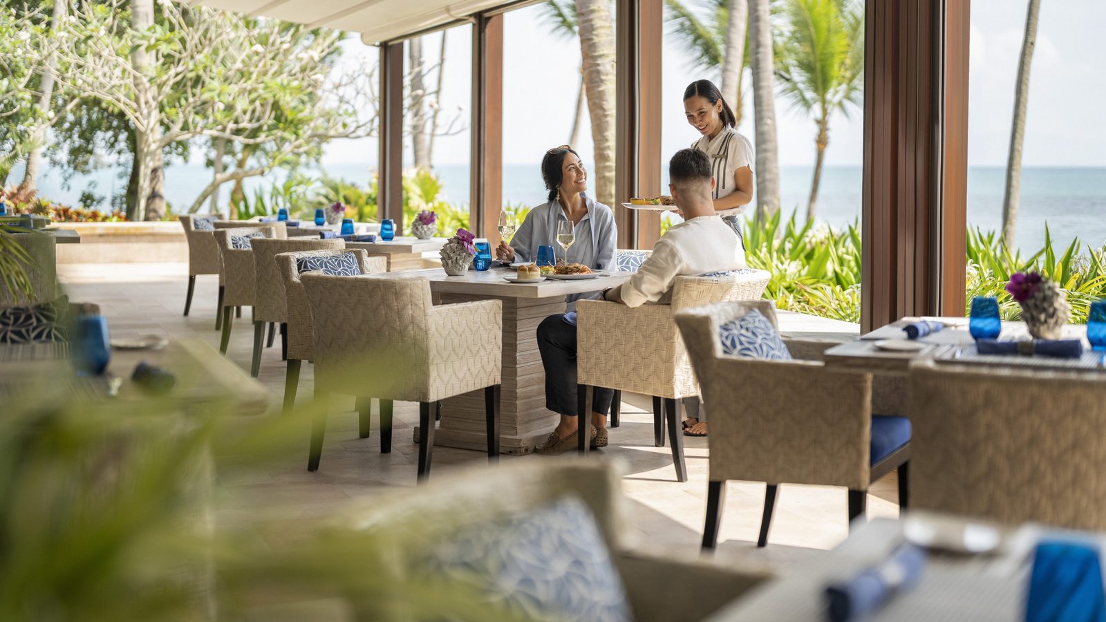 Open-sided restaurant by the beach at Four Seasons Resort Koh Samui