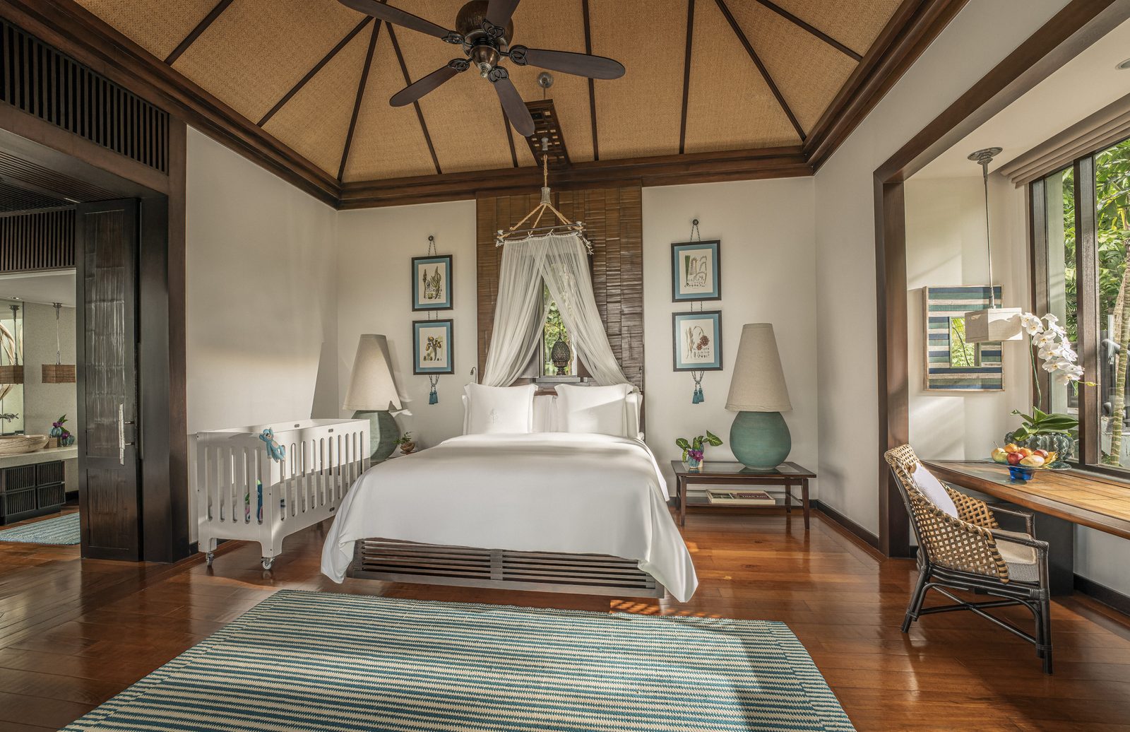 Villa bedroom with a vaulted wooden ceiling at Four Seasons Resort Koh Samui