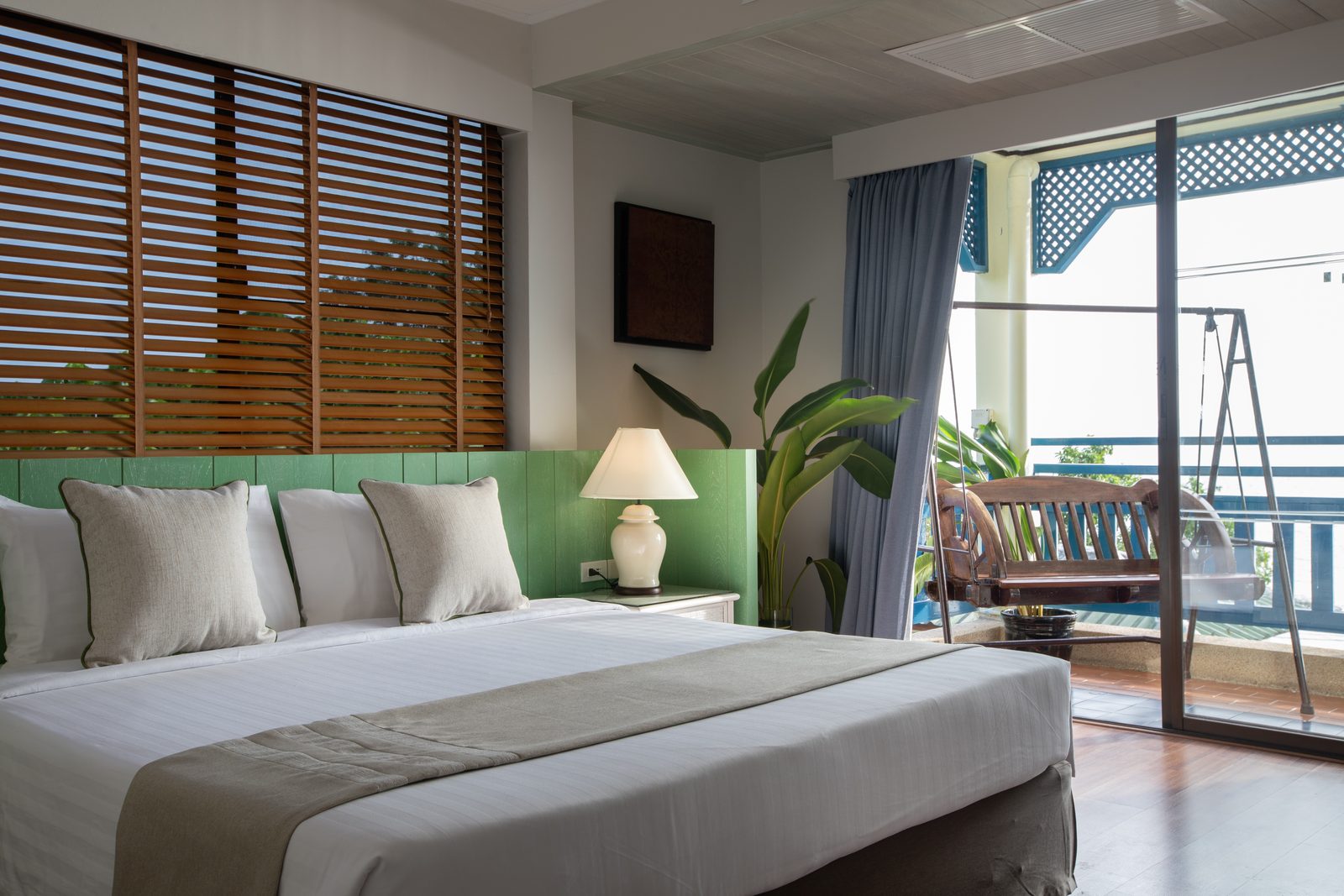 Bedroom with balcony in a two-bedroom unit at Kantary Bay Hotel, Phuket