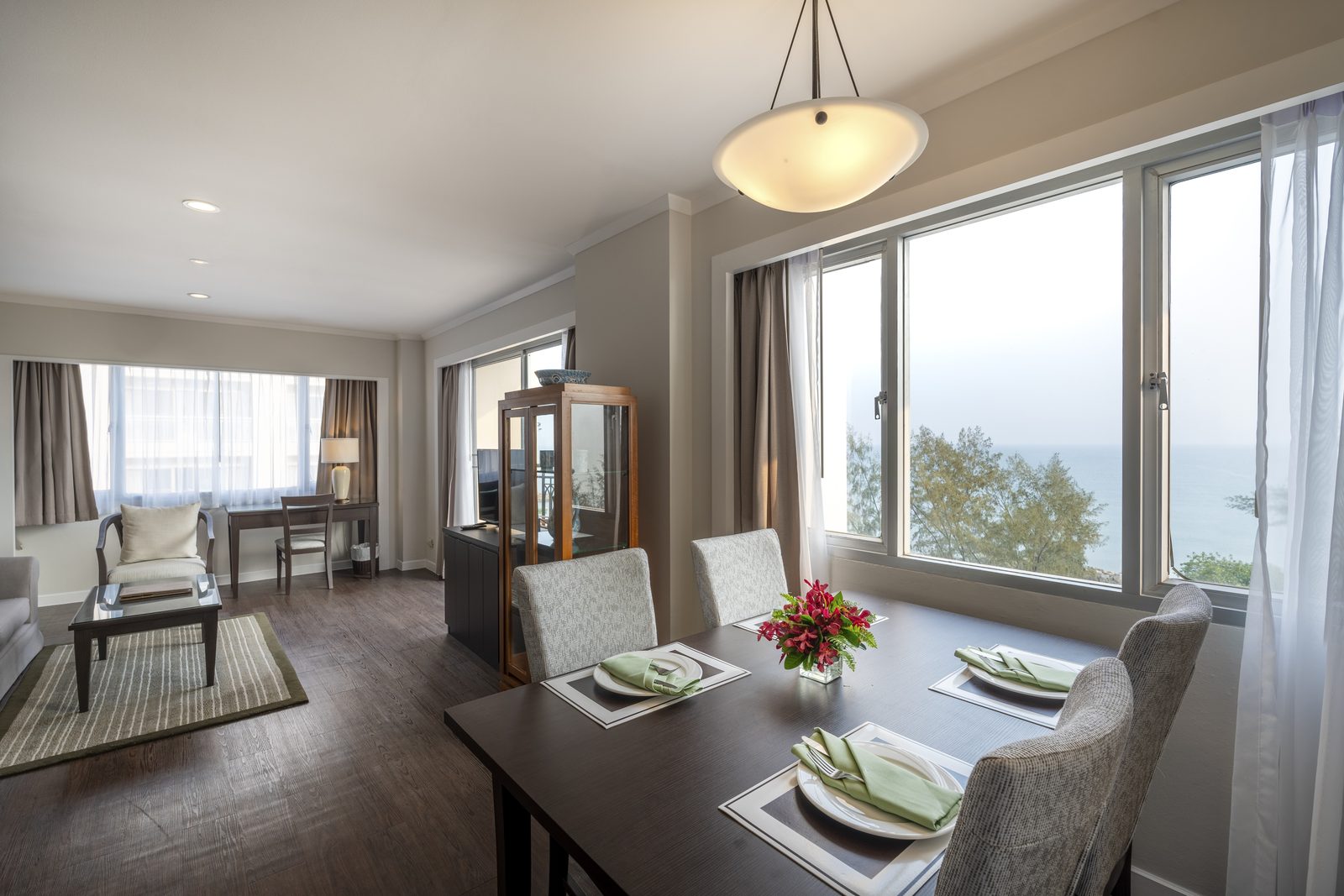 One Bedroom Premier Suite living and dining area at Kantary Bay Hotel, Rayong