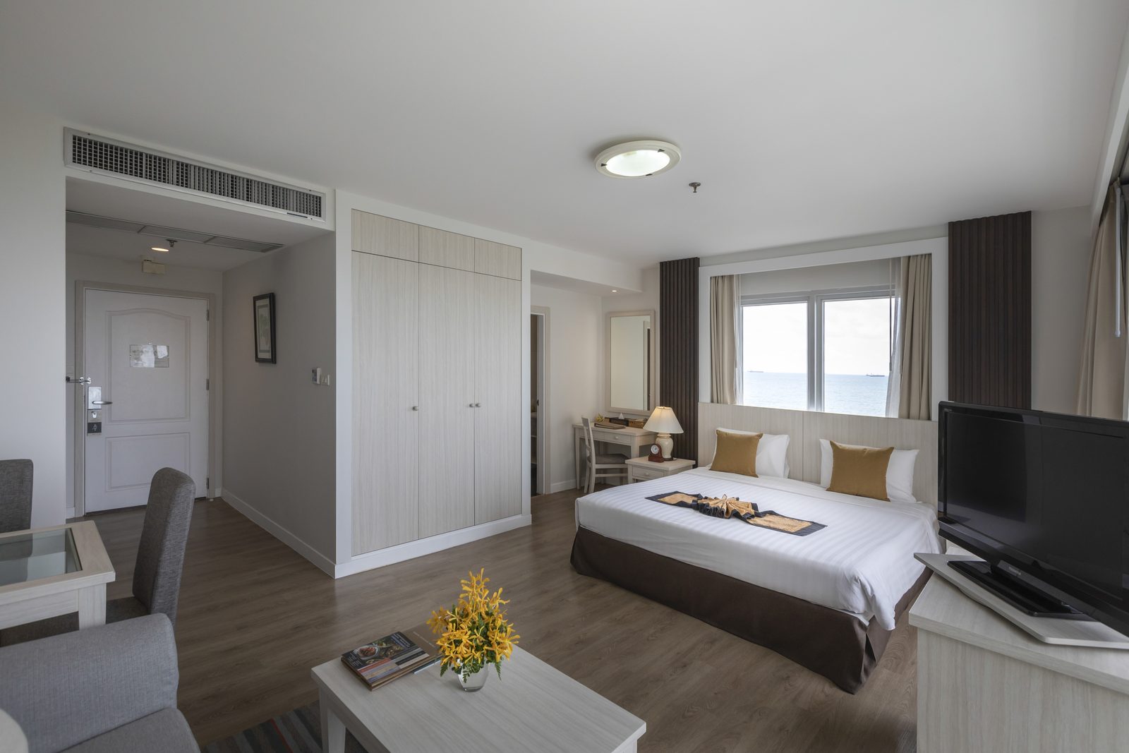 Studio Suite bedroom and sitting area at Kantary Bay Hotel, Rayong