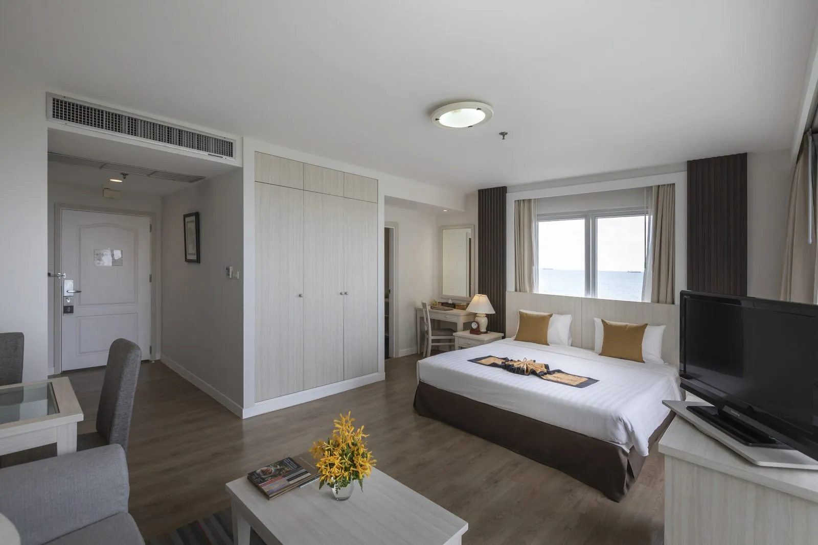 Studio Suite bedroom and sitting area at Kantary Bay Hotel, Rayong