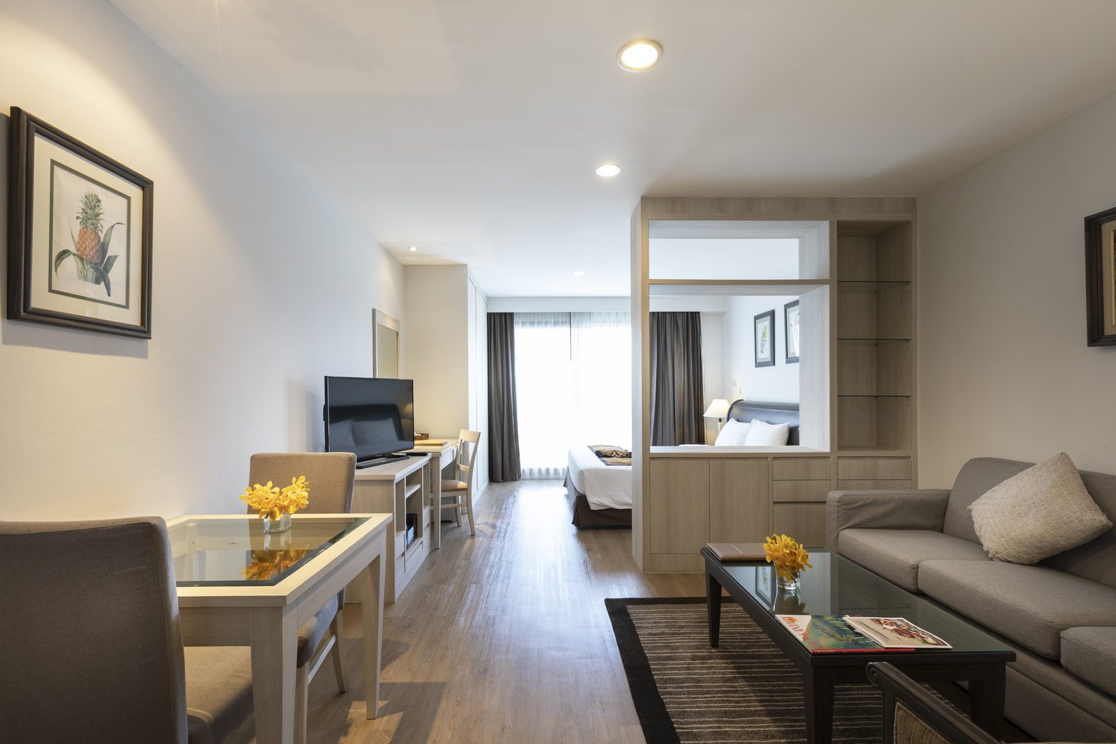 Studio Suite living area with dining table at Kantary Bay Hotel, Sriracha