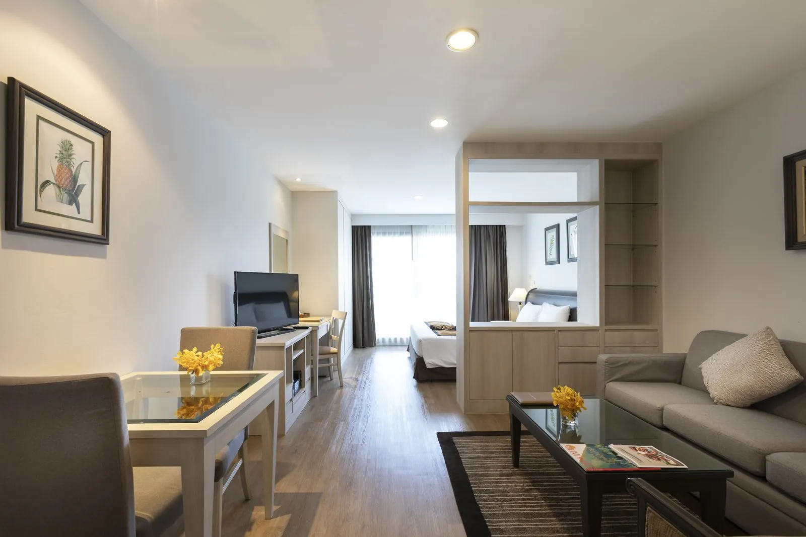Studio Suite living area with dining table at Kantary Bay Hotel, Sriracha