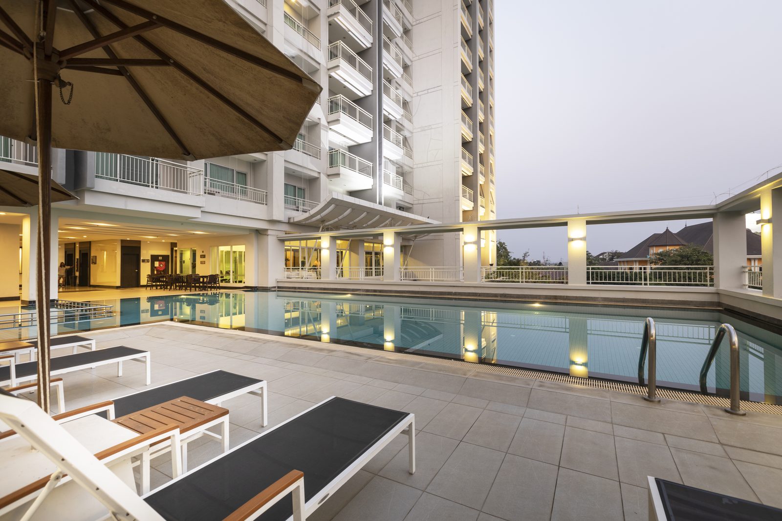 Outdoor swimming pool and loungers at Kantary Hotel, Kabinburi