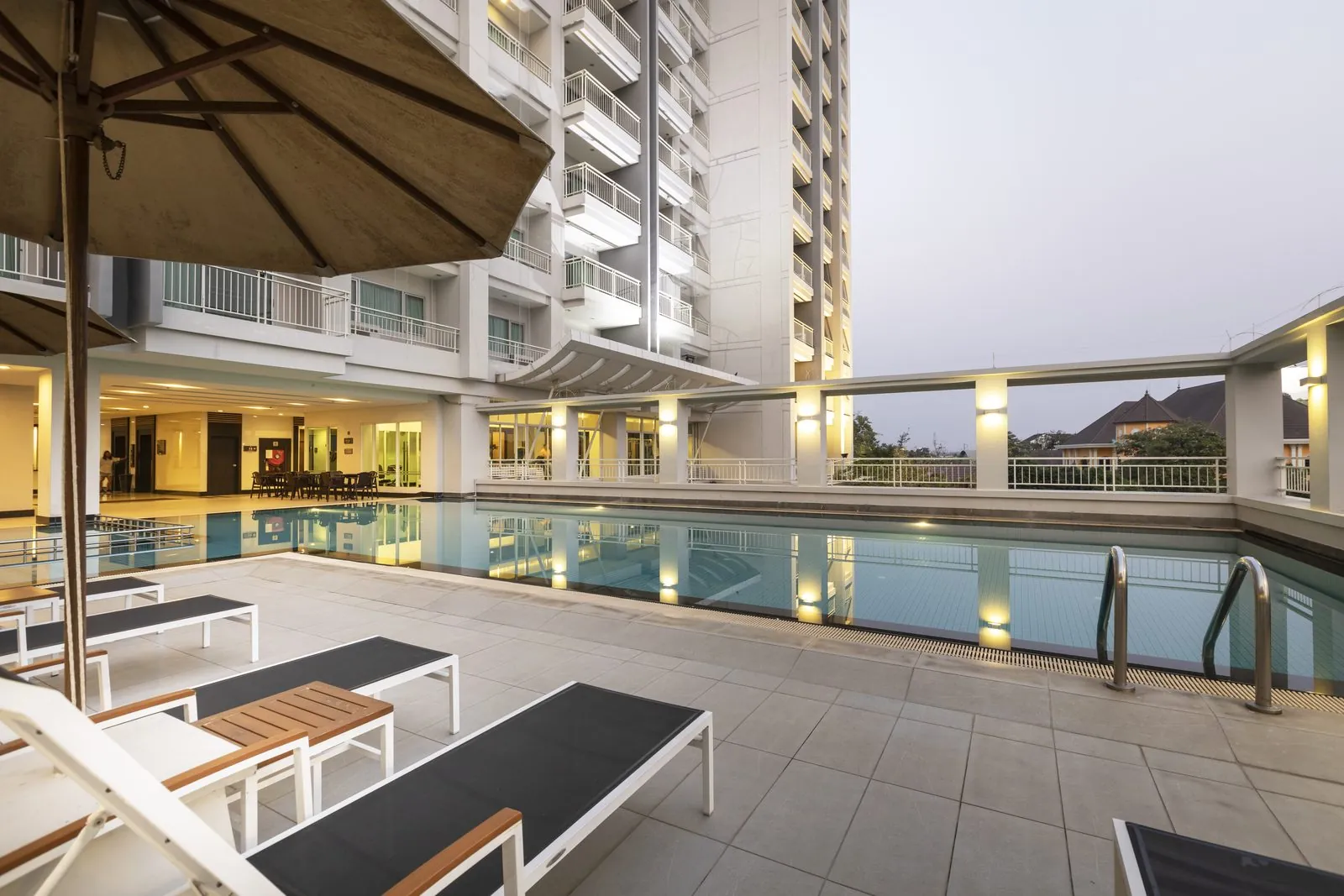 Outdoor swimming pool and loungers at Kantary Hotel, Kabinburi