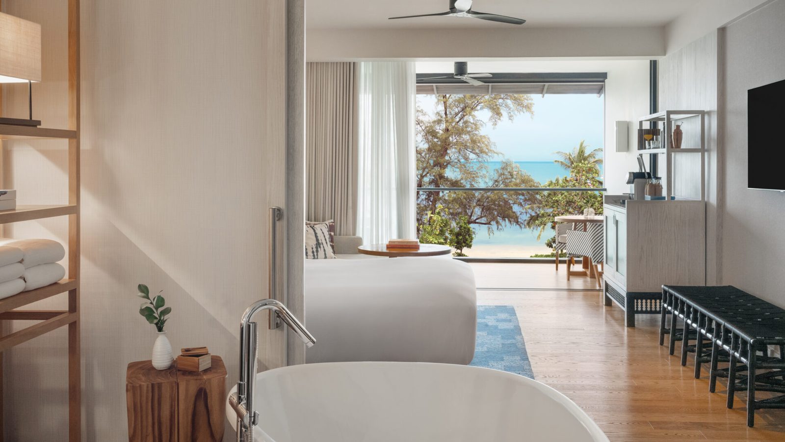 Essential Sea View room with a freestanding bathtub and terrace facing the sea at Kimpton Kitalay Samui
