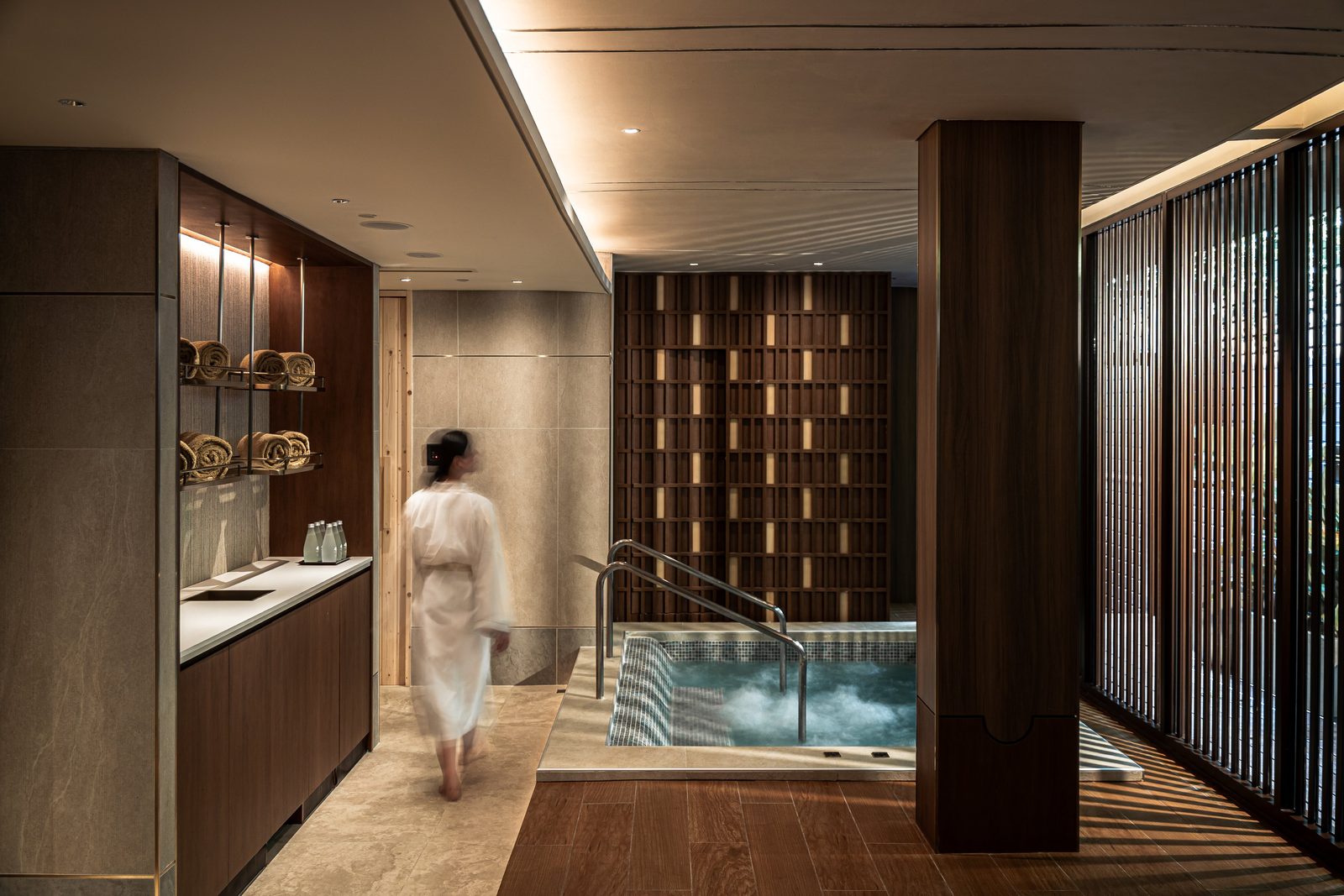 Wood-panelled wellness area with a plunge pool at Mandarin Oriental, Bangkok