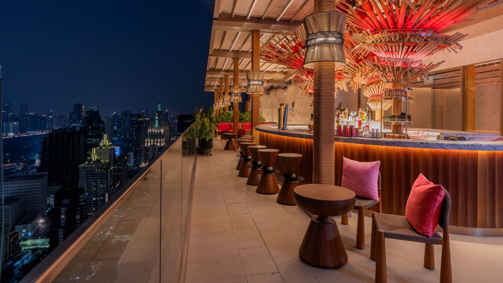 Sato San Rooftop Bar at night with the Bangkok skyline, Moxy Bangkok Ratchaprasong