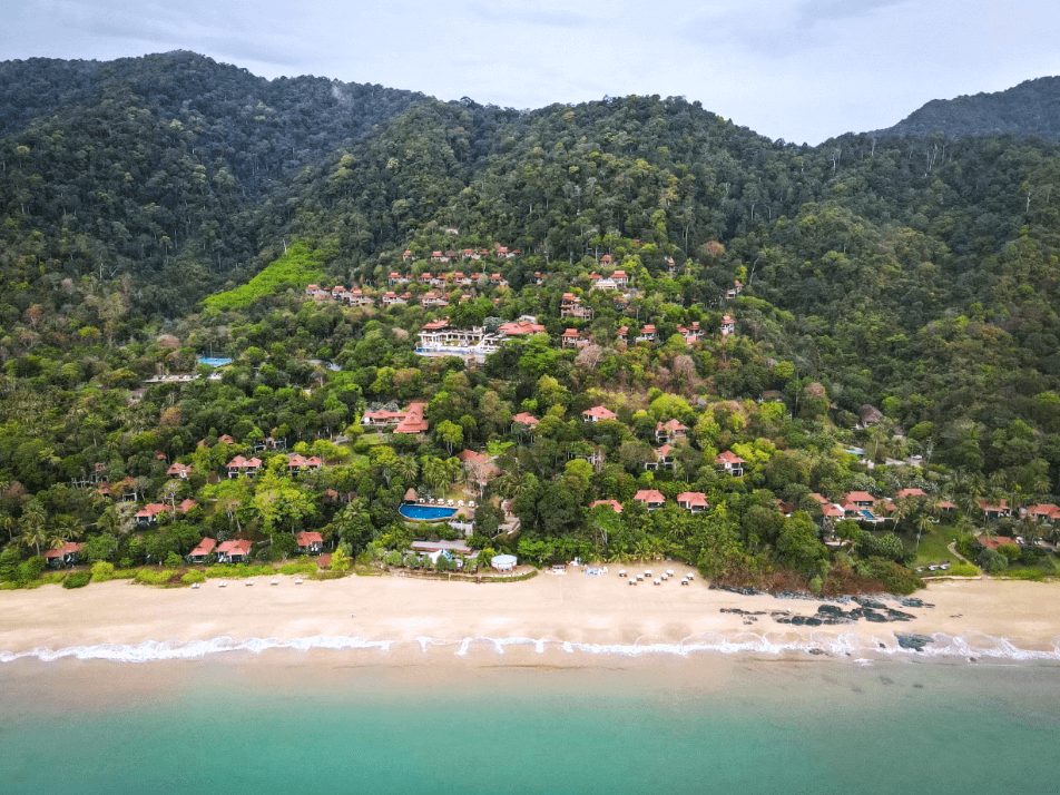 Aerial view of Pimalai Resort & Spa on the forested hillside above Ba Kan Tiang Beach, Koh Lanta