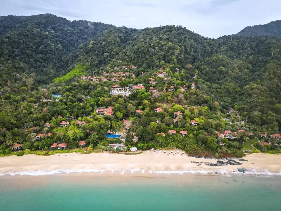 Aerial view of Pimalai Resort & Spa on the forested hillside above Ba Kan Tiang Beach, Koh Lanta