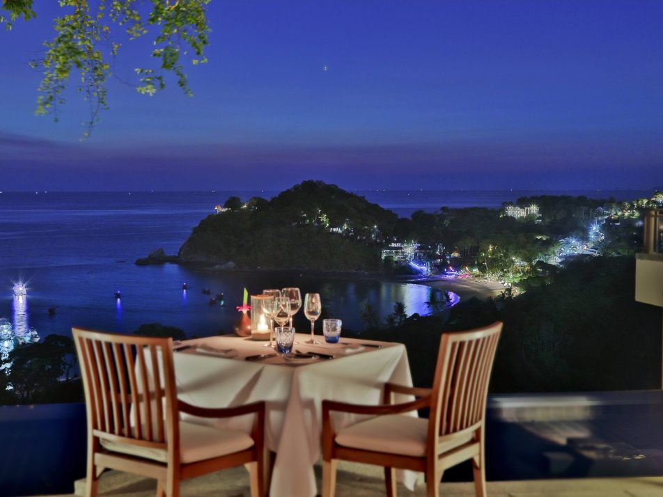 Dinner table at dusk overlooking the sea at Seven Seas Restaurant, Pimalai Resort & Spa
