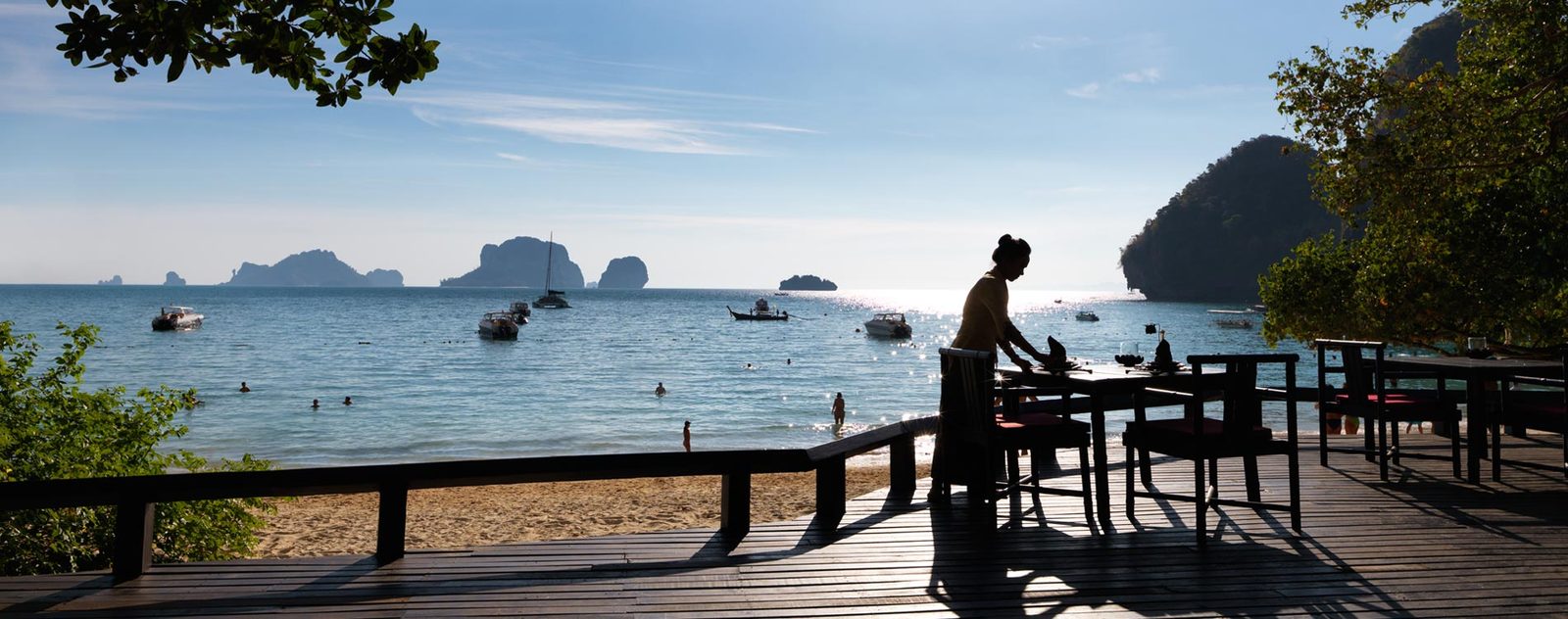 Beachside dining deck looking out to limestone islands at Rayavadee, Krabi