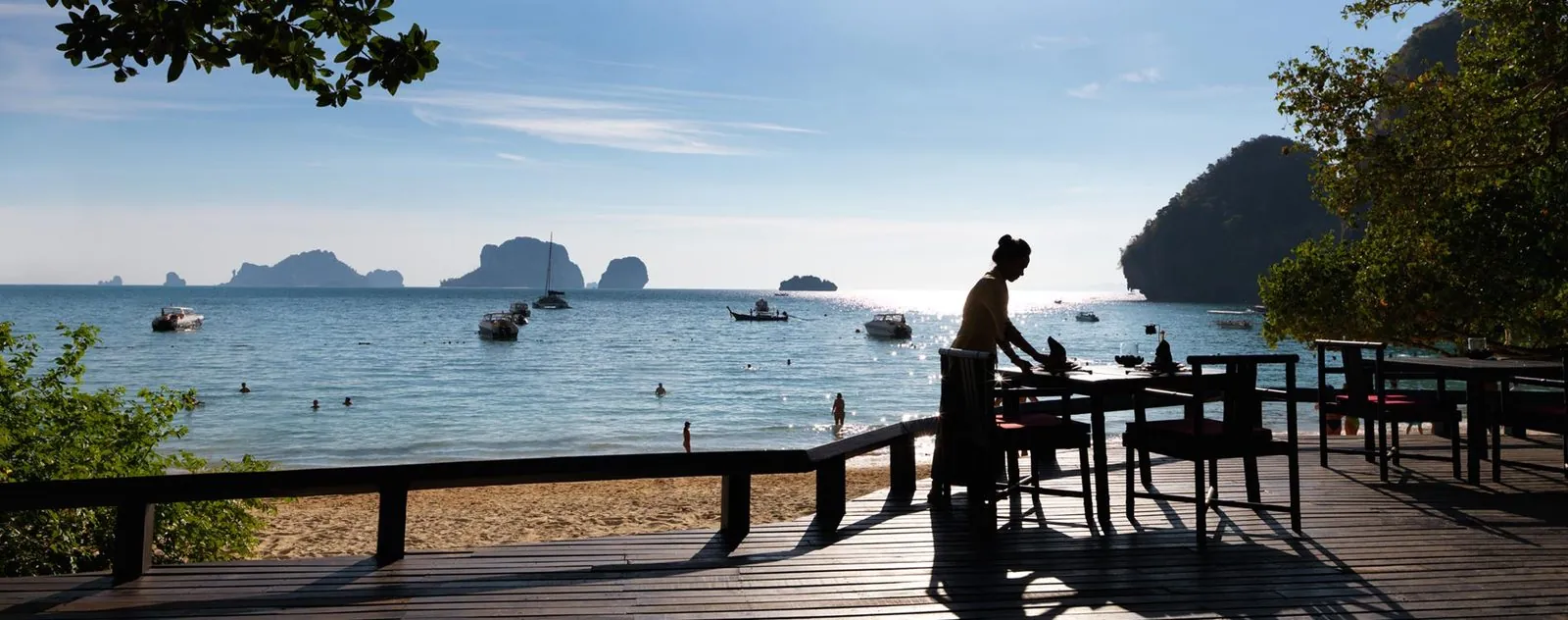 Beachside dining deck looking out to limestone islands at Rayavadee, Krabi