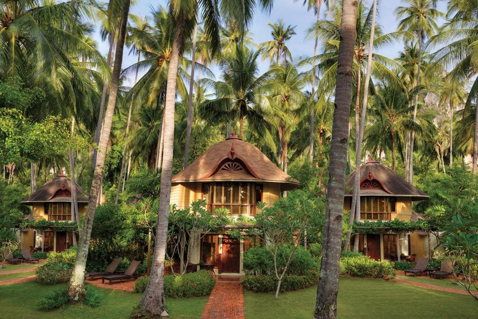 Two-storey Deluxe Pavilions among palms at Rayavadee, Krabi