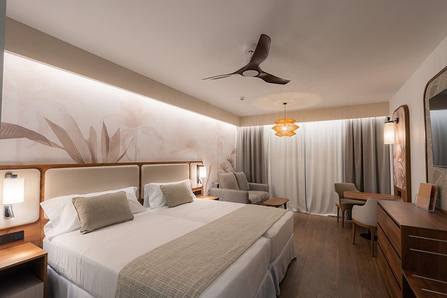 Junior Suite bedroom with twin beds at Hotel Riu Palace Phuket
