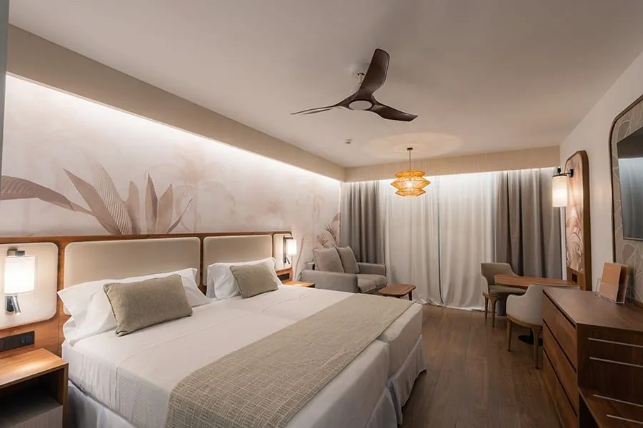 Junior Suite bedroom with twin beds at Hotel Riu Palace Phuket