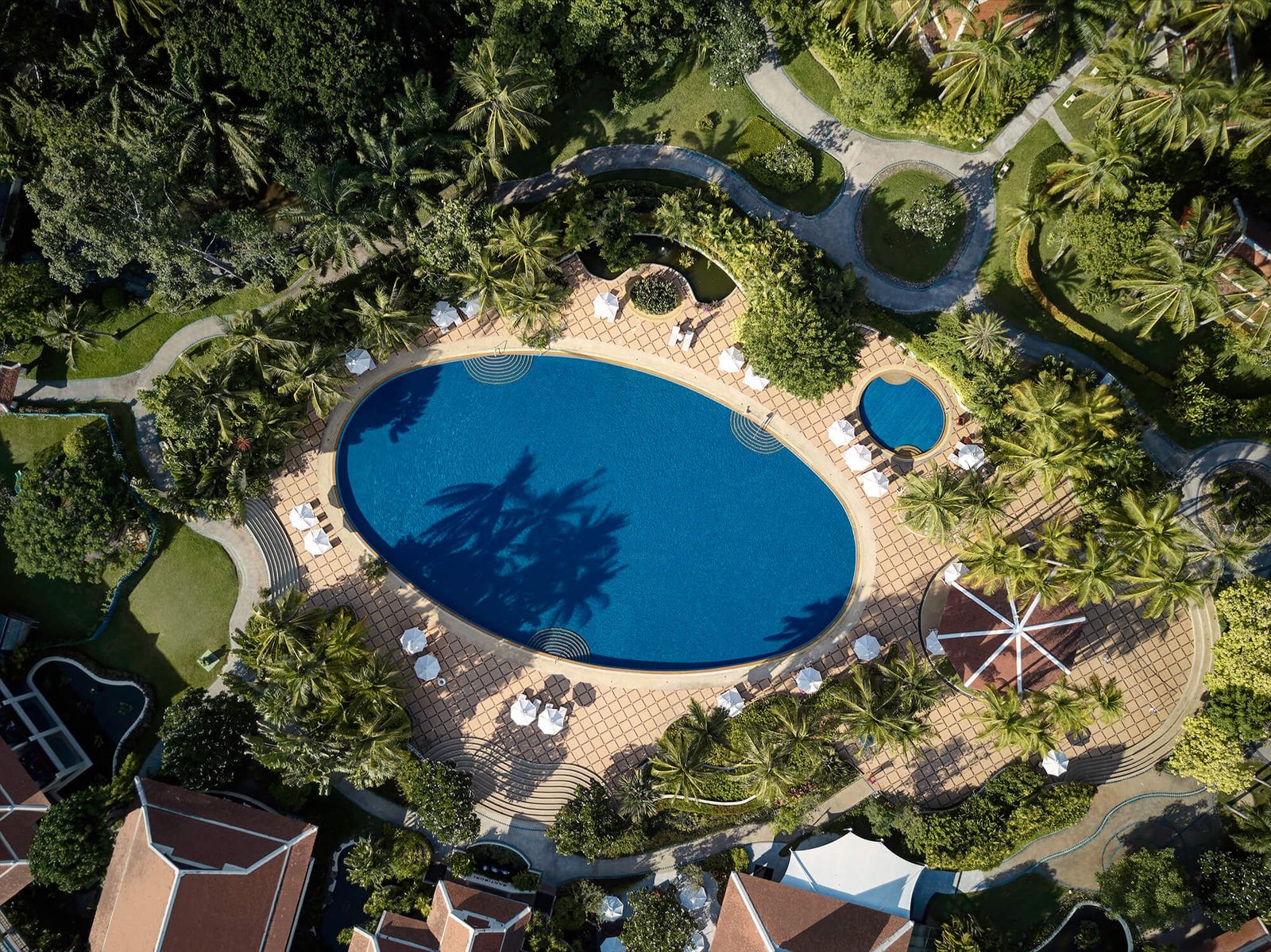 Aerial view of the pool and surrounding gardens at Santiburi Koh Samui