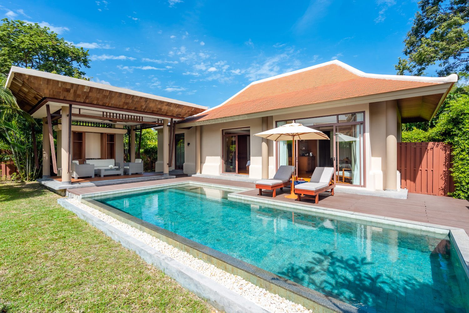 Grand Deluxe Pool Villa with its private swimming pool, deck and lawn at Santiburi Koh Samui