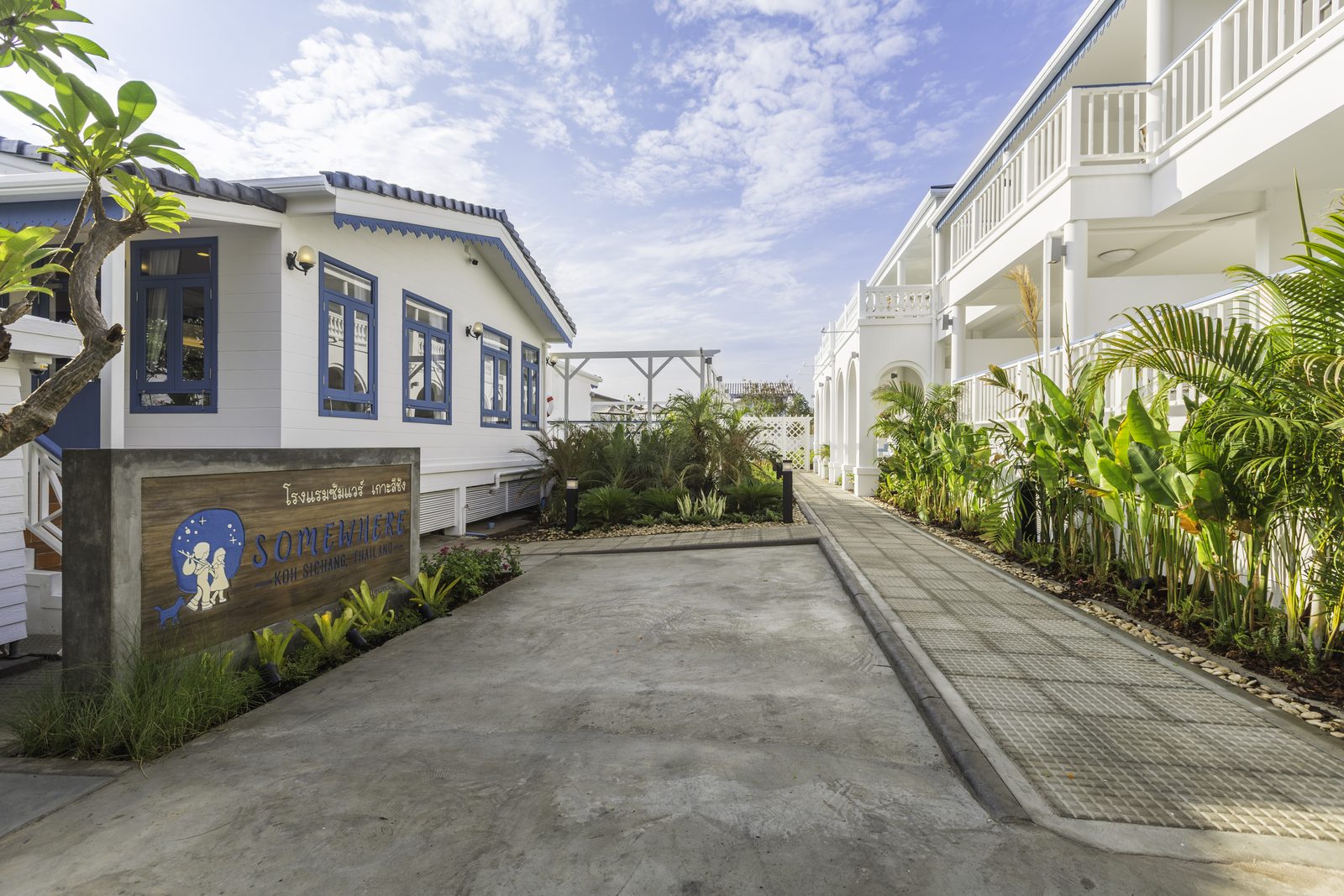 Entrance and driveway of Somewhere Hotel, Koh Sichang, with the hotel sign