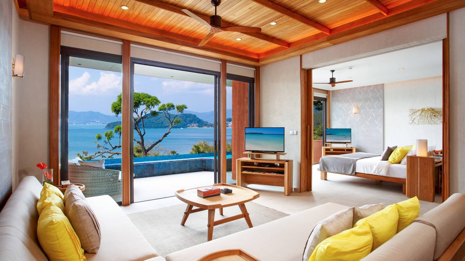 Penthouse Ocean View living area and bedroom at Sri Panwa Phuket, with pool and sea view