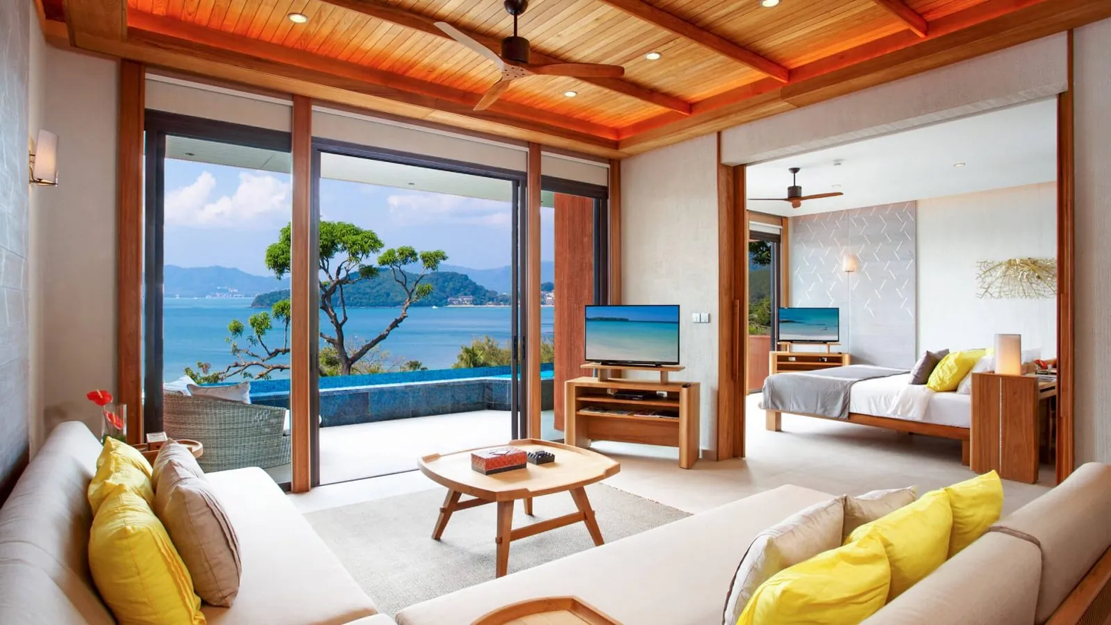 Penthouse Ocean View living area and bedroom at Sri Panwa Phuket, with pool and sea view